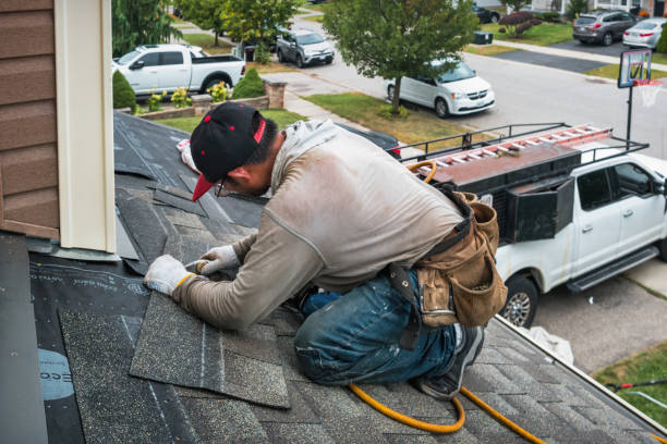 Professional Roofing technician working in West Kennebunk, ME